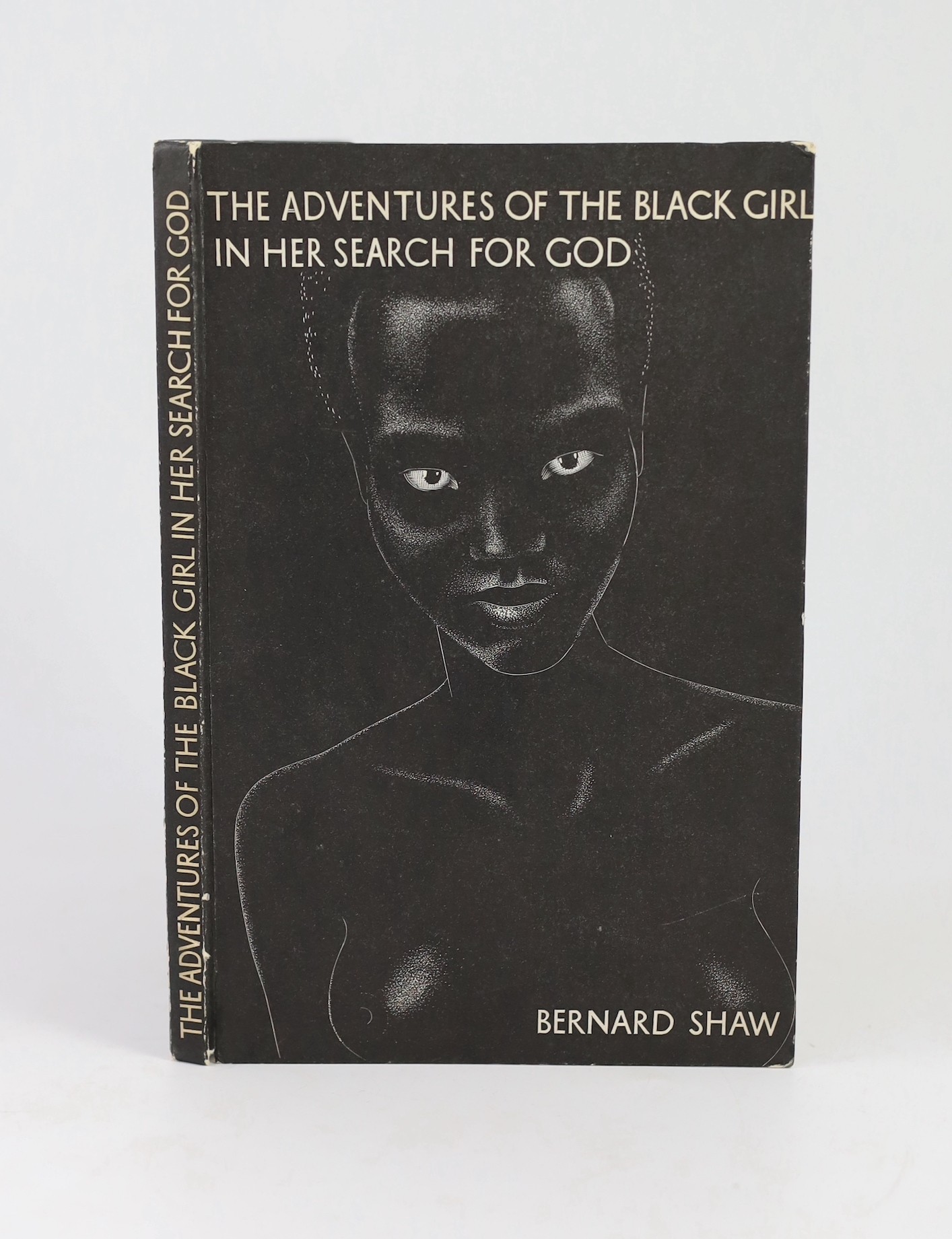 Shaw, Bernard - The Adventures of the Black Girl in her Search for God, 1st edition, illustrated with 20 wood engravings by John Farleigh, 8vo, original pictorial boards, Constable & Company Limited, London, 1932